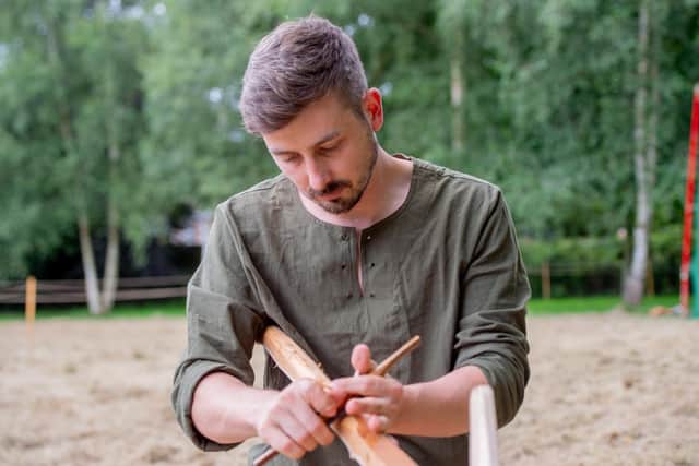 Ian Sturgess making a bow.