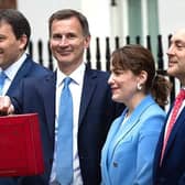 Finance Minister and MP for Louth and Horncastle Victoria Atkins (second right) with Chancellor James Hunt (centre) ahead of today's Budget..