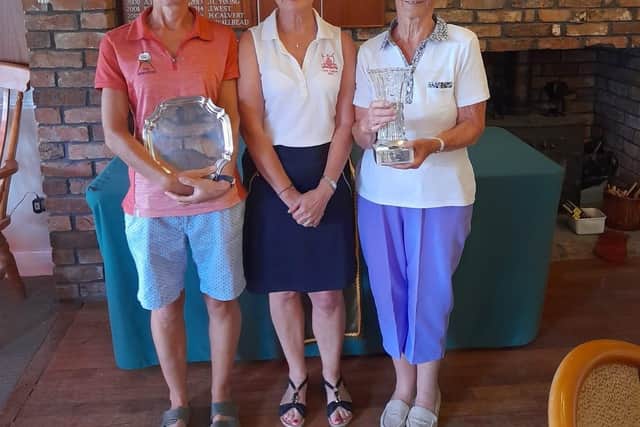 Ruth Simpson Ladies Champion with the Tray for Best Gross. To the left of Lynn Worthington (lady captain) is Val Simpson winner of Best nett.