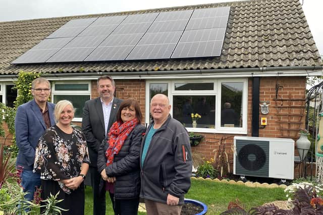 Billinghay residents with solar panels and air source heat pump installed at their council home. L:R (Former) NKDC Chief Executive Ian Fytche, Louise Reynolds, Regional Director, Equans, Council Leader Cllr Richard Wright, Mrs and Mr Jackson of The Whyche, Billinghay.