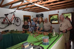 Mayor of Skegness Coun Adrian Findley with the family of the late Rev John Borman and the railway they donated.