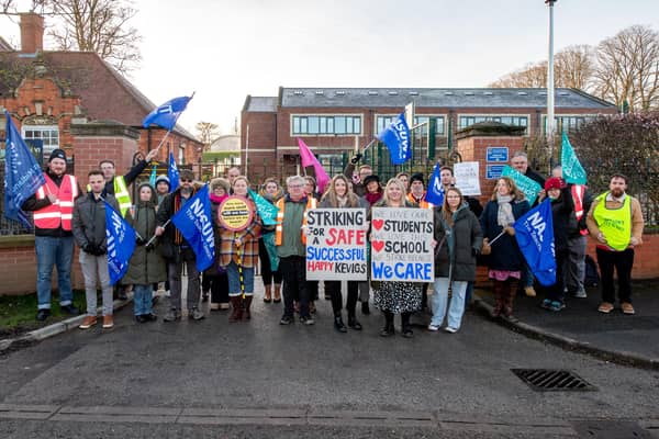Striking teaching staff on the picket line outside King Edward VI Grammar School, Louth, on Thursday morning. Photo: John Aron