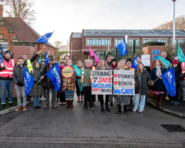 Striking teaching staff on the picket line outside King Edward VI Grammar School, Louth, on Thursday morning. Photo: John Aron