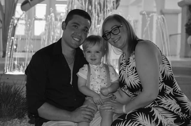 The late Michael Reynolds, of Boston, with wife Charlotte and son Jacob.