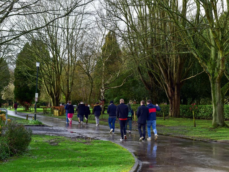Friends and family make their way into Boston Crematorium for Adi's funeral