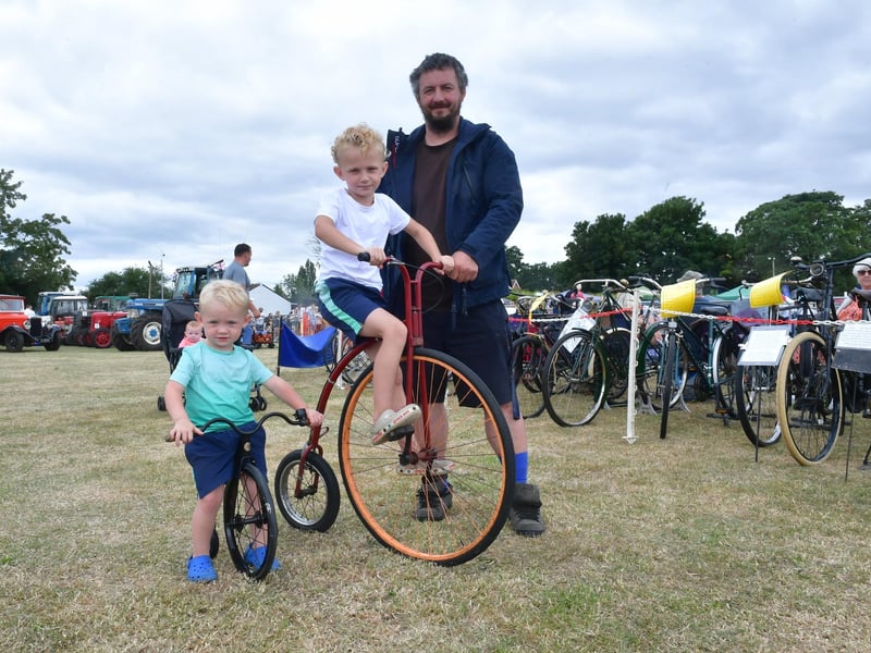 Steven, five, and Martin, two, with Paul Sellars of Boston Veteran Bicycle Club.