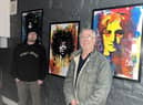 Artist Alfred Natcho (left) with Ross Ellis of Old Nick's Tavern.