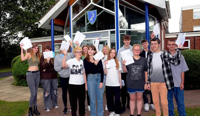 Somercotes Academy students with their results.