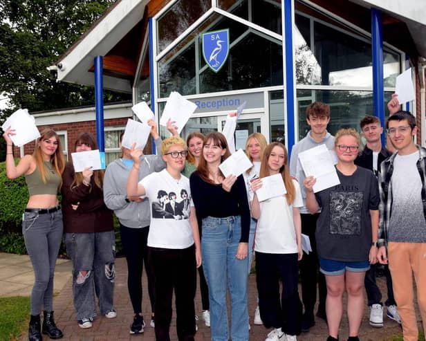 Somercotes Academy students with their results.