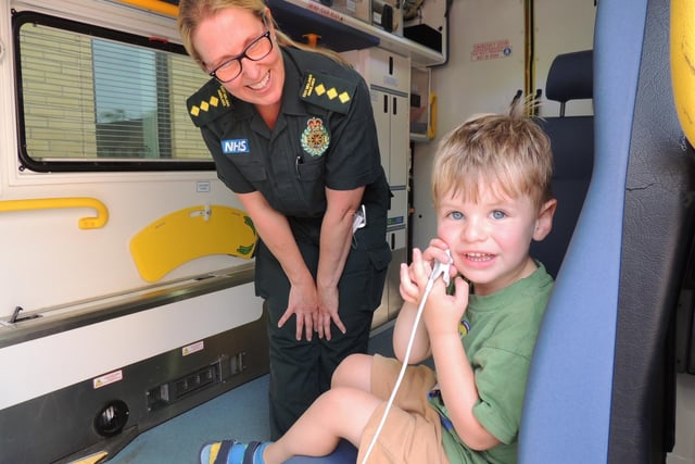 Edward Yates, three, of Sleaford gets checked over by ambulance crew member Anne Berry.
