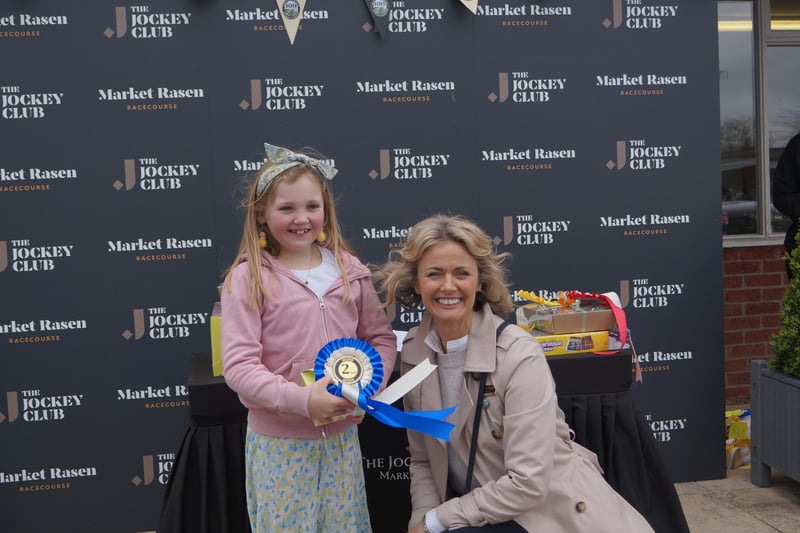 Sky Marsland collected her second place prize in the Horse Drawing competition from Sue Lucas