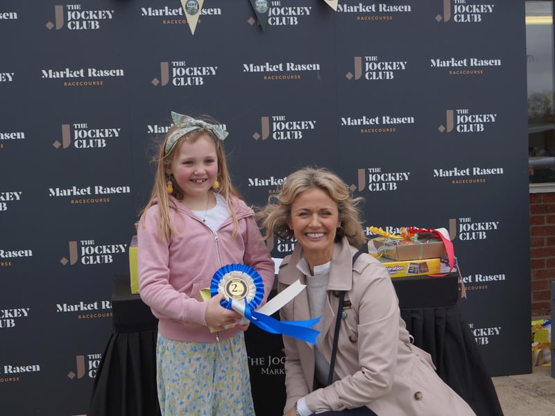 Sky Marsland collected her second place prize in the Horse Drawing competition from Sue Lucas