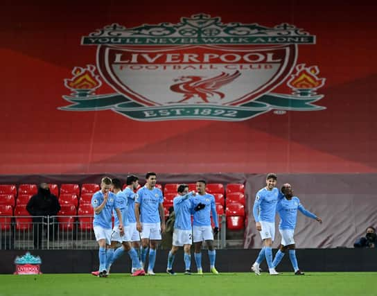 Champions Liverpool are now well off the pace after defeat to Man City  (Photo by Laurence Griffiths/Getty Images)