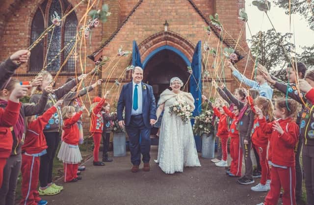 Jo and Mike's wedding at St Peter’s Church, with the Rainbows and Guides as a guard of honour. Sam Freeman/Cannon in the Country