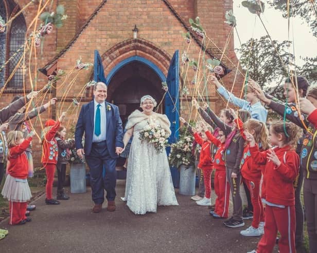 Jo and Mike's wedding at St Peter’s Church, with the Rainbows and Guides as a guard of honour. Sam Freeman/Cannon in the Country