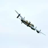 The Lancaster banking towards East Kirkby Aviation Centre after flying over RAF Spilsby.