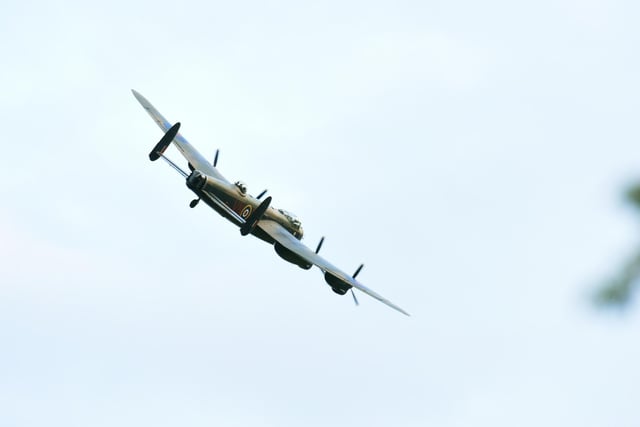 The Lancaster banking towards East Kirkby Aviation Centre after flying over RAF Spilsby.