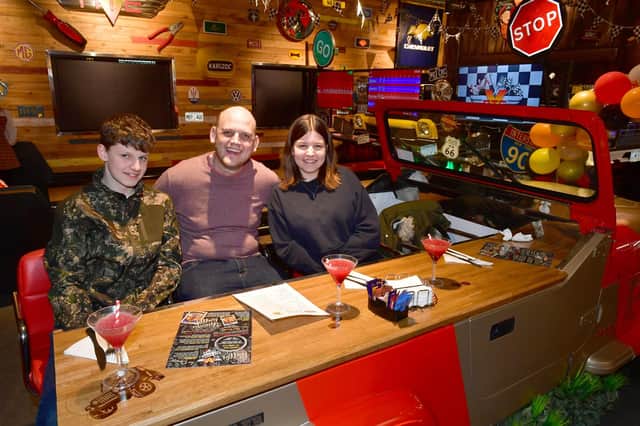 Pictured (from left) Rhys Sharmon, 13, Dale Sharman, and Izzy Sharmon, 15, of Sibsey