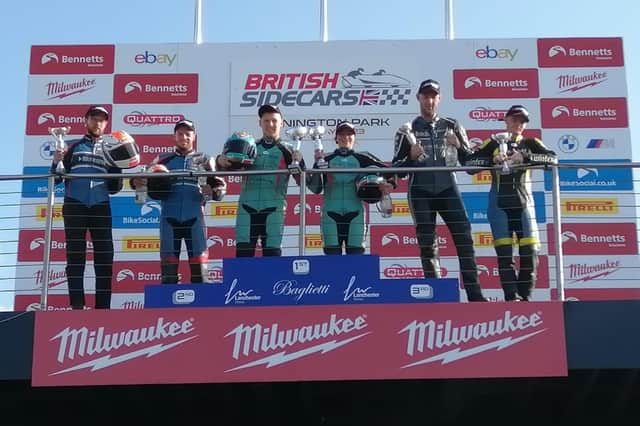 Todd Ellis and Emmanuel Clement (centre) after one of their wins at Donington Park. Photo: Dave Yeomans.