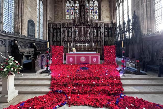 Members of the community helped to crochet and knit the poppies.