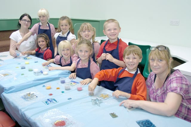 Year two pupils at Chestnut Street CofE Primary School are pictured taking part in a workshop led by Liz Pearson, right, from the Glass Room in Leasingham. She is pictured with teacher Gemma Simeoli.