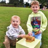 Teddy and Charlie Genery  playing with the Jenga. Photos: Mick Fox