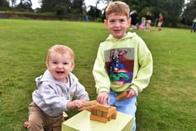 Teddy and Charlie Genery  playing with the Jenga. Photos: Mick Fox
