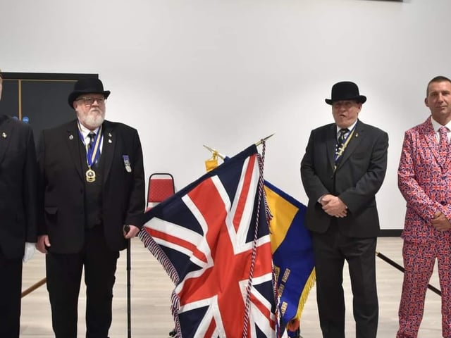 Ady Findley, executive committee member of Skegness Royal British Legion (right) showed allegiance to the Queen on her Platinum Jubilee by donning a union flag suit.