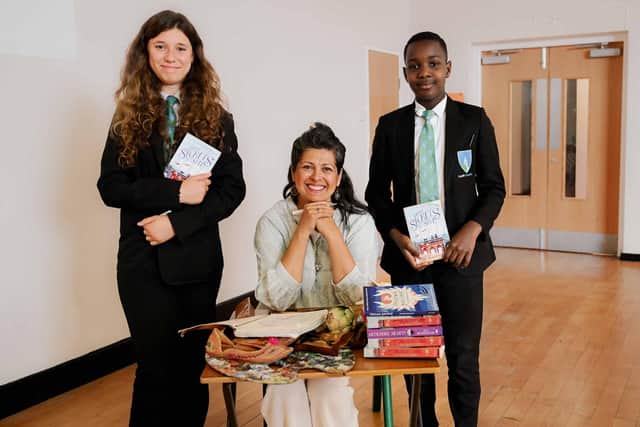 Sita signed books for some lucky students.