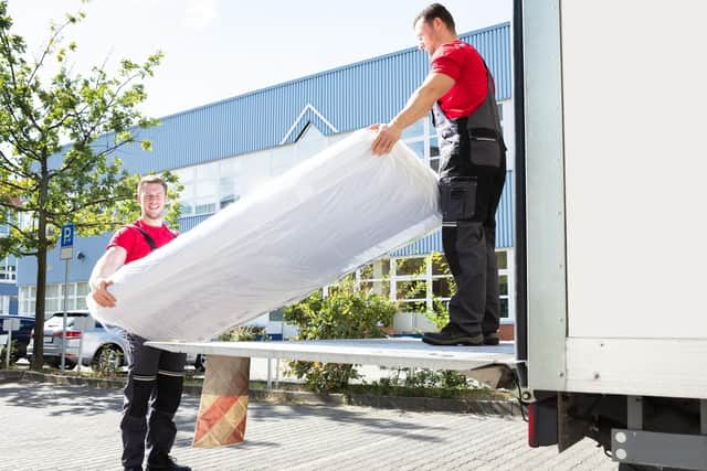 Book removal men and leave it to the professionals (photo: Adobe)