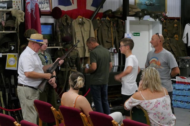 Visitors interact with the many vintage objects, weapons and artefacts from the Second World War.
