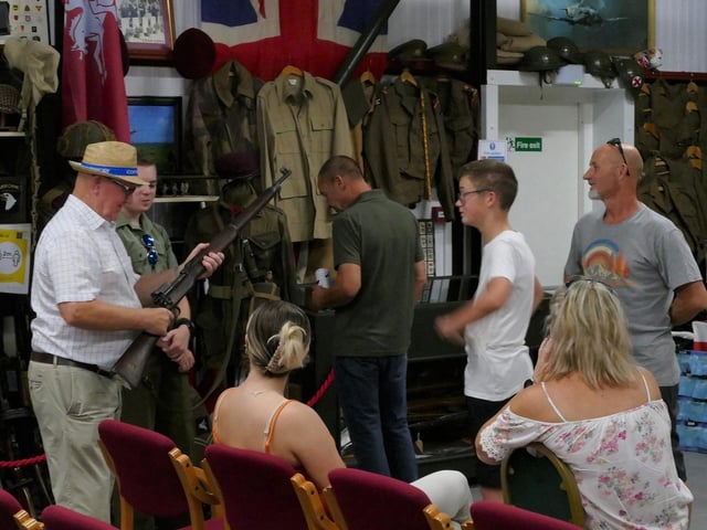 Visitors interact with the many vintage objects, weapons and artefacts from the Second World War.