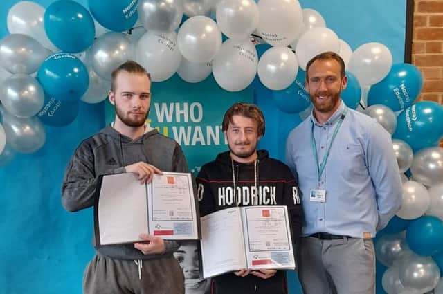Davidas Junda (left) and Carl Jones-Dyda collecting their results at Boston Nacro.