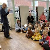 Mark Baker gives a talk to the children.