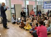 Mark Baker gives a talk to the children.