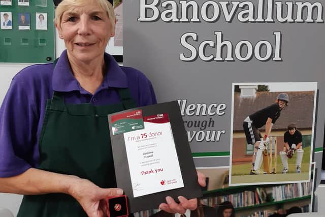 Lorraine Hassall with her 75th donor awards.