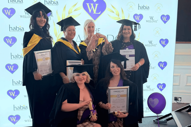 Top of the class -- members of the Re:new Hair and Beauty by Expressions team in Woodhall Spa celebrate their achievements at the WeLove Purple Hearts event.