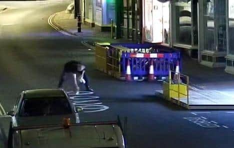 An image of the man police want to interview in connection with the Mercer Row graffiti.