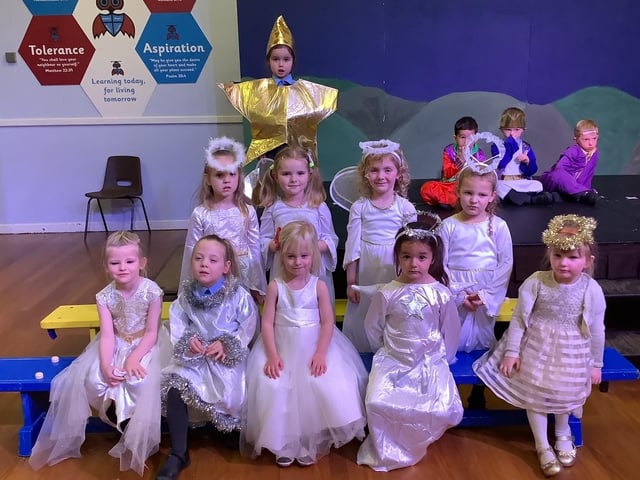 Angels and a star in William Alvey School's Nativity play.