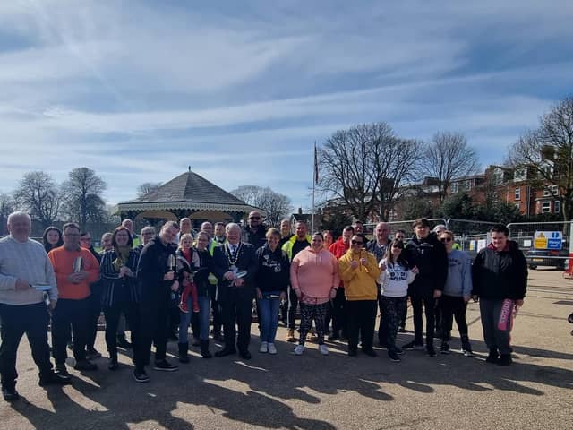 Mayor of Skegness Coun Pete Barry with teams involved in the community planting day in Tower Gardens, Skegness.
