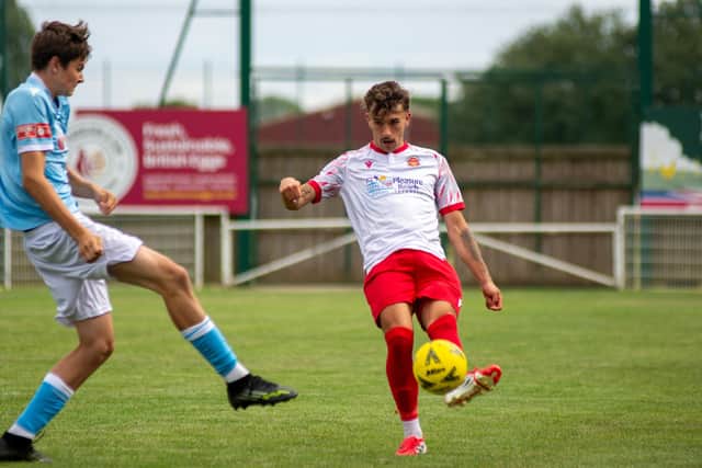 Kyle Radford tries to close down the cross. Photo by Ryan Thompson (Happy Snapz Photography).