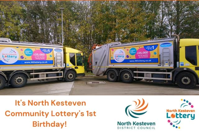 The district's bin lorries are helping celebrate the NK Lottery's first birthday.