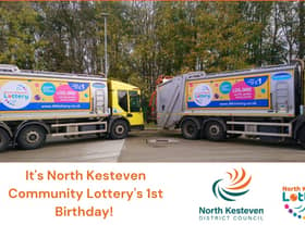 The district's bin lorries are helping celebrate the NK Lottery's first birthday.