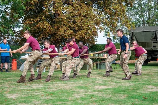Paratroopers do battle in the tug-o-war. Photo: Deborah Knowles