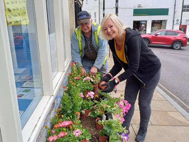 Caistor in Bloom lead Michael Galligan with one of the volunteers.