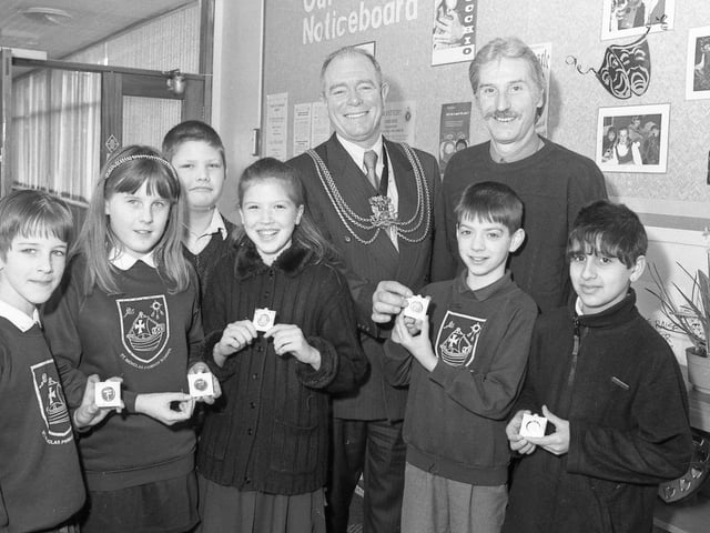 Pupils at St Nicholas Cof Primary School, Boston, being presented with their Millennium medals by Mayor of Boston Coun Paul Goodale. Pictured with the pupils - all school council members - is headteacher John Such.