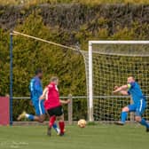 Fraser Bayliss' shot which led to his goal. Pic by Clive Stapleton Photography