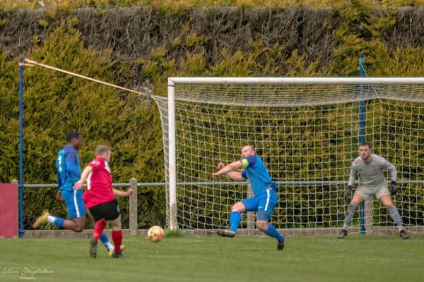 Fraser Bayliss' shot which led to his goal. Pic by Clive Stapleton Photography