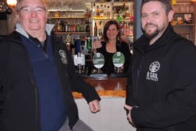 Pub rescue. From left – Tony Pygott – director, Jan Antink – bar manager, and Tony Carter, brewery pub manager.