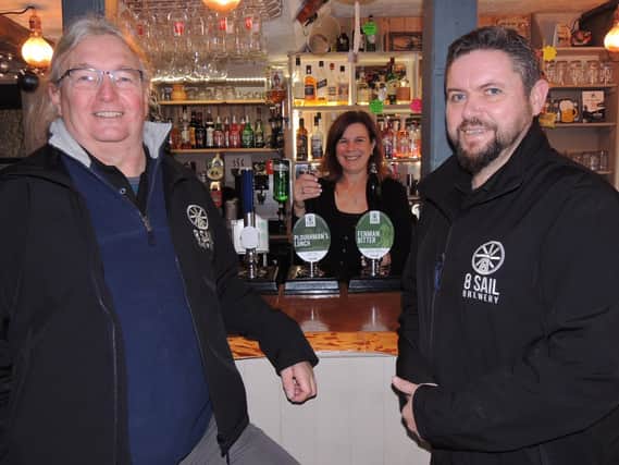 Pub rescue. From left – Tony Pygott – director, Jan Antink – bar manager, and Tony Carter, brewery pub manager.